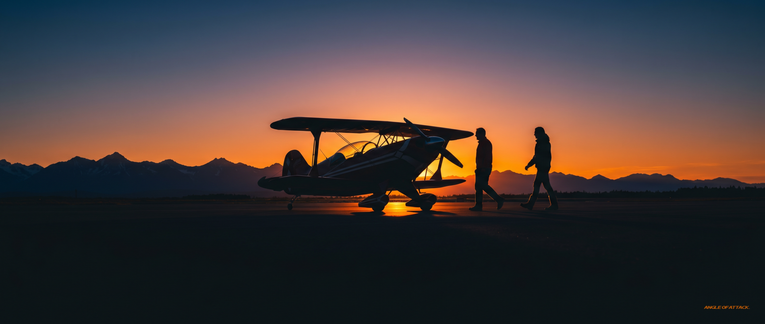 Spin-capable airplane silhouetted at sunset on a flight school ramp — Angle of Attack CFI spin endorsement