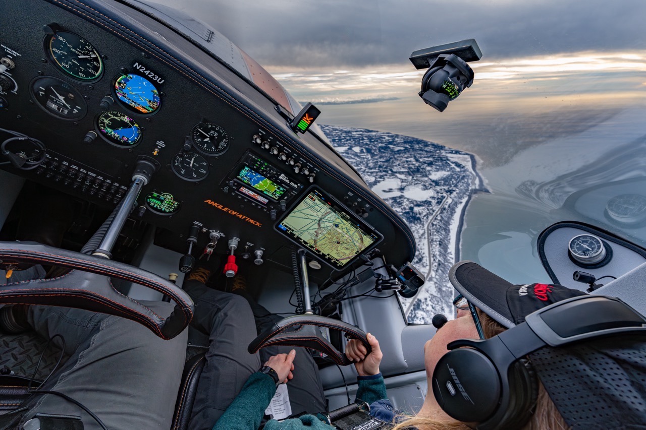 CFI instructor and student in cockpit at sunset